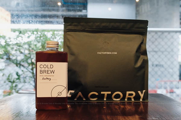 Bottle of Factory Coffee cold brew and coffee beans, Bangkok
