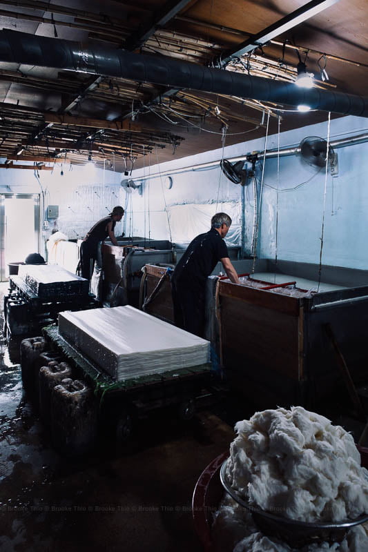 Workers make each sheet of hanji by immersing a bamboo screen in a large wooden frame into a mixture of water and paper mulberry pulp.